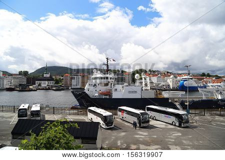 BERGEN N,ORWAY - JULY 3, 2016: This is one of the cargo and passenger sea berths town near the castle Bergenhus.