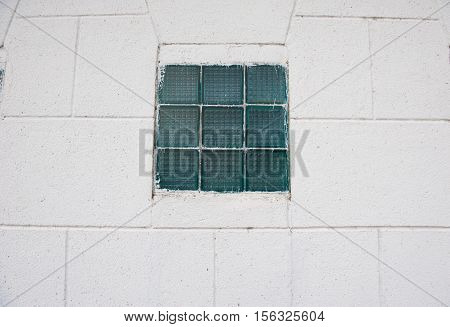 window classic on the wall. color green older windo