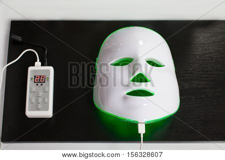 Light rejuvenating mask for facial skin therapy.