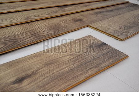 laying laminate flooring and dark wood colors - floor laying