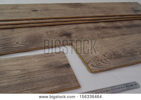 laying laminate flooring and dark wood colors - floor laying