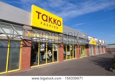 BURG / GERMANY - NOVEMBER 13 2016: Branch from TAKKO fashion shops. TAKKO is one of the largest German textile traders with over 1900 branches in Germany and other European countries.