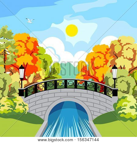 Beautiful park in the fall. Trees with red and yellow foliage. Rapid River. Beautiful antique bridge and cast-iron fence. The black wrought-iron lanterns at the bridge. The bridge reflected in the river. Sun and clouds.