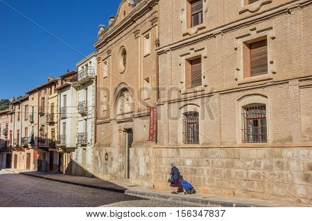 DAROCA, SPAIN - OCTOBER 28, 2016: Central cobblestoned street of medieval city Daroca in Spain