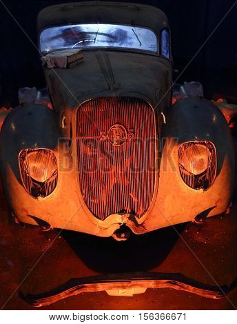 MOSCOW - MAR 07, 2016: Dirty retro car on exhibition Oldtimer-Gallery in Sokolniki Exhibition Center. It is only one in Russia exhibition of vintage cars and technical antiques