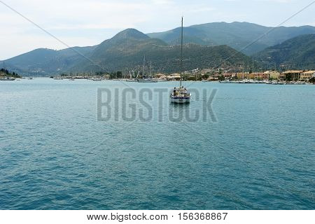 Nidri GREECE May 11 2013: Yacht returning to port in the evening. Ionian sea Greece.