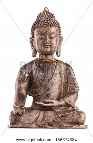 Buddha Shakyamuni's figure in a blessing pose - varada mudra. The old statue made of metal isolated on a white background.