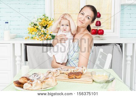 At the table sat mother and the child.