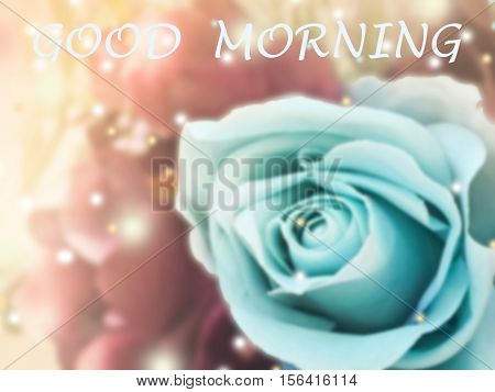 sweet dreamy and de-focused Good morning word on vintage background bouquet of blue roses with flare light