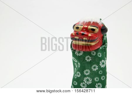 New Year decorations of traditional lion dance(Shishimai) of Japan on white background.