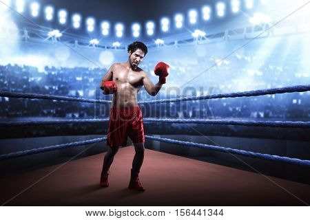 Asian Boxer Guy Training Uppercut Before The Game