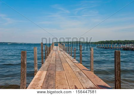 Pier on Lake Spirit at bright summer day Arnolds Park, Iowa, USA