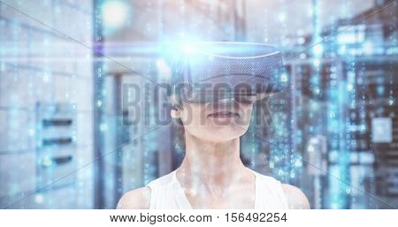 Digitally generated black and blue matrix against woman using reality virtual goggles