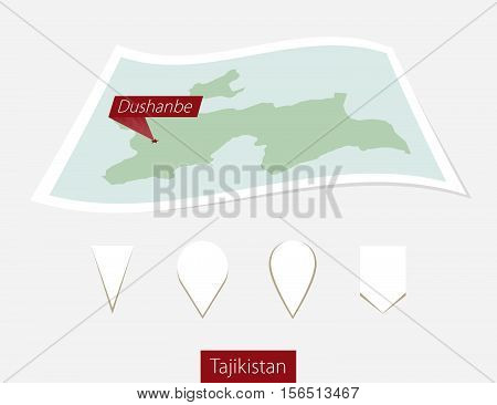 Curved Paper Map Of Tajikistan With Capital Dushanbe On Gray Background. Four Different Map Pin Set.