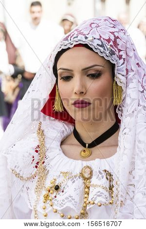 CAGLIARI, ITALY - May 1, 2016: 360 ^ Sant'Efisio Festival - Sardinia - portrait of a beautiful woman in traditional Sardinian costume