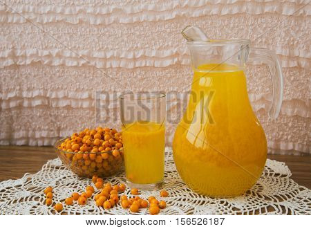 buckthorn on a handful of therapeutic knitted napkin