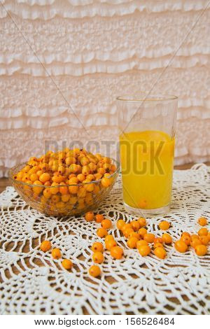 buckthorn on a handful of therapeutic knitted napkin