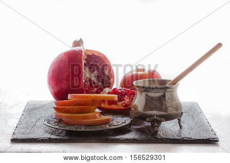 Apples, pomegranate and honey for Rosh Hashanah.