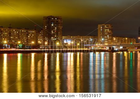 A view of the city at nightilluminated by bright lights.
