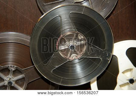 Old rare reel to tape recorder. Vintage bobine with the music. Nineteenth - twentieth century - most popular medium of recorded music. Historical analog media sound information for gramophones.