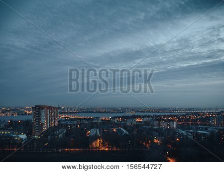 Night Voronezh city from the roof. Blue sky, night lights. Cityscape concept
