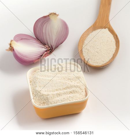 Cooking Brazilian Farofa. Manioc Flour. Farinha de Mandioca on white background