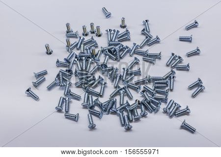 Some bolts and nuts on white background