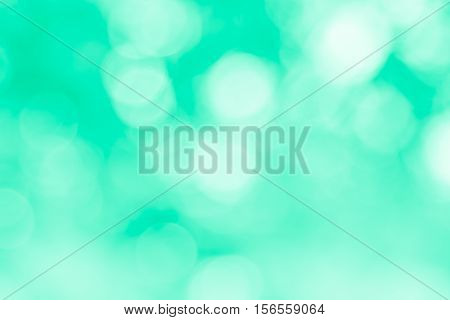 Blurred nature background.Backdrop with color and bright sun light. Summer holidays concept.bokeh background or Christmas background.Green Energy.