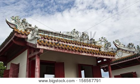 AYUTTHAYA, THAILAND - November 4, 2016: Detail of the roofs of Phra Thinang Wehart Chamrun at the Bang Pa-In summer palace in Thailand