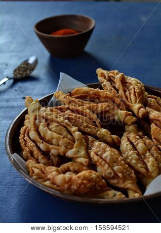 Champa kali-An Indian deep fried crisp snack made with flour and spices