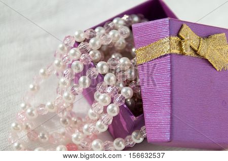 Ajar Purple Box With Pink Pearl Strings  Приоткрытая лиловая коробка с розовыми жемчужными нитями