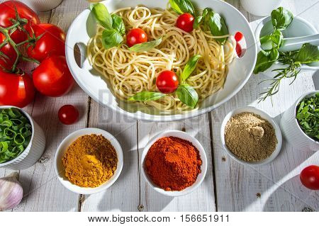 Italian table filled with vegetables on old wooden table