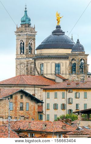 Scenic view of stone towers and tiled roofs in the old historic part of town. Bergamo. Italy.