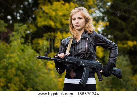 Nice Girl With Arms In Autumn Day
