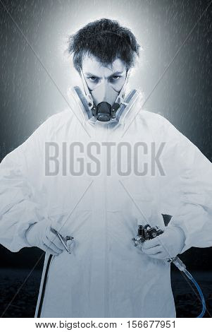 Worker with airbrush gun black and white photo