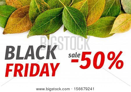 Black Friday conceptp. One side frame from pied autumn leaves isolated on white background