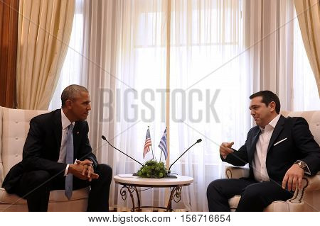 Greek Prime Minister Alexis Tsipras, Right, Speaks With U.s. President Barack Obama