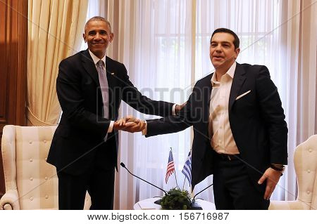 Greek Prime Minister Alexis Tsipras, Right, Speaks With U.s. President Barack Obama