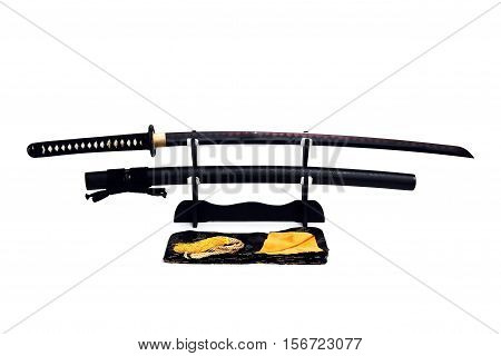 Katana Japanese sword on black stand white background