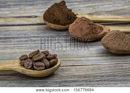 Beautiful Little Wooden Spoon With Coffee On  Background
