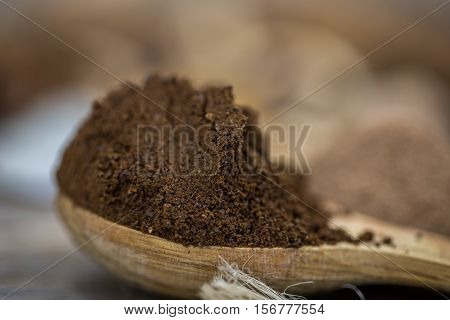 Beautiful Little Wooden Spoon With Coffee On  Background