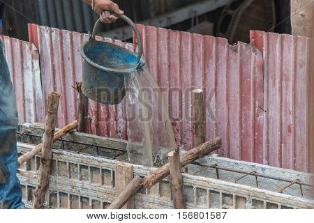 Concrete pouring during commercial concreting floors of buildings in construction(Commercial Building)
