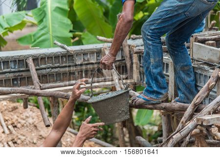 Concrete pouring during commercial concreting floors of buildings in construction(Commercial Building)