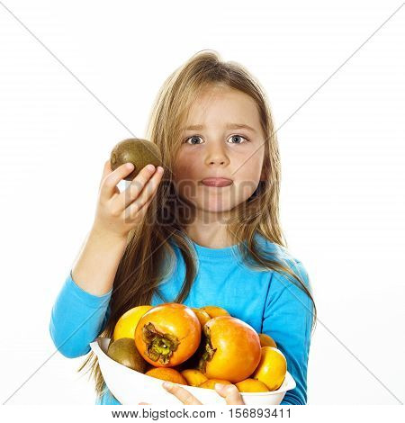 Cute Little Girl With Plate Of Fruits: Kiwi, Date Plum, Mandarins, Etc.