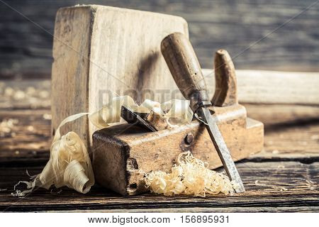 Wooden Hammer And Planer In A Carpentry Workbench