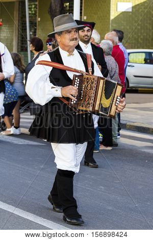 QUARTU S.E., ITALY - September 17, 2016: Parade of Sardinian costumes and floats for the grape festival in honor of the celebration of St. Helena. - Sardinia