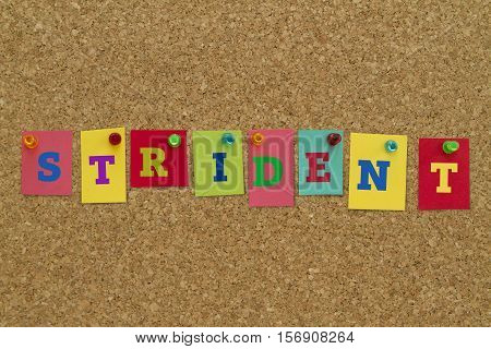 Strident word written on colorful sticky notes pinned on cork board.