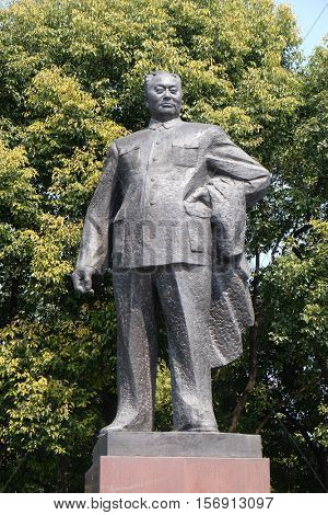 SHANGHAI - FEBRUARY 29. Statue of Chen Yi, first mayor of Shanghai on the Bund in Shanghai. This 5.6m high bronze sculpture was erected at 1993 in Shanghai, China, February 29, 2016.