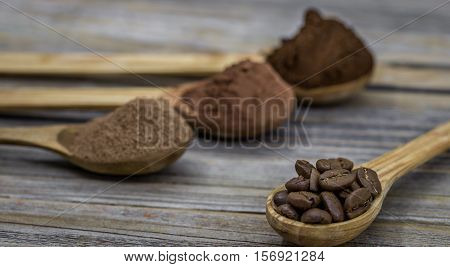 Beautiful Little Wooden Spoon With Coffee On  Background