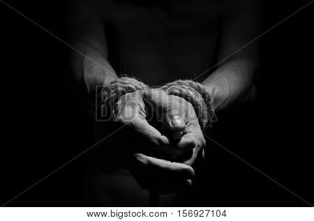Man with a rope tied his hands